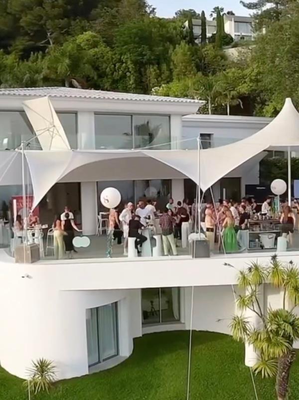 A party at a mansion in France.