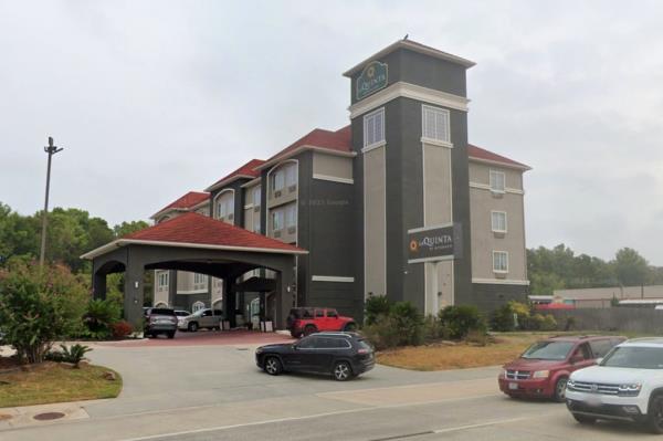 Scott was arrested at this La Quinta Inn & Suites hotel in Magnolia, Texas, just 15 minutes from Exxon's headquarters in Spring.